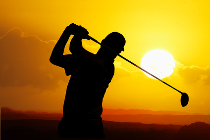 Golfer in Sunset
